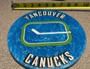 resin   canucks stick  round 