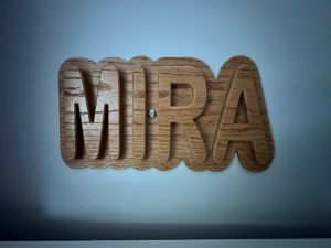 wood   name sign  mira 