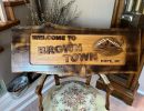 wood   sign  brown town 