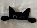 wood   sihlouette  peeking cat 